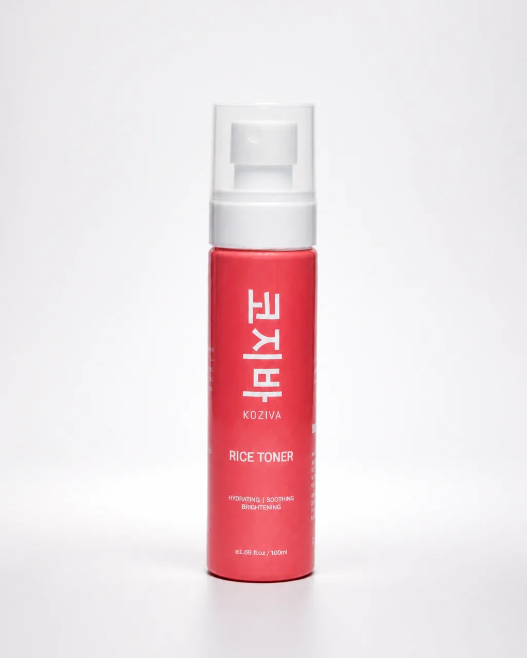 Koziva rice toner, a red 100 ml bottle with a white pump, on white