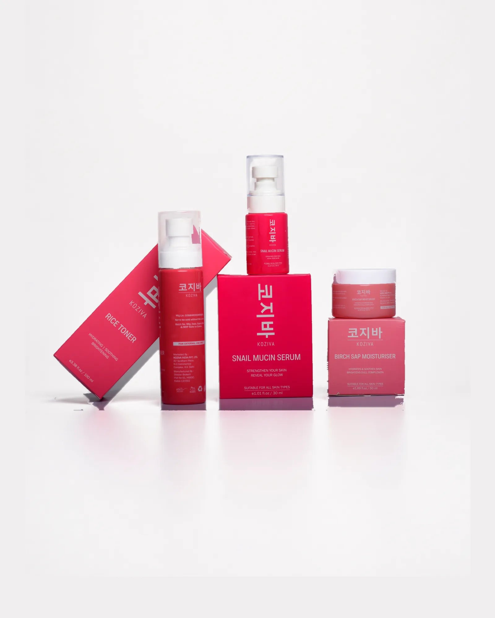 The full Koziva range stacked with its boxes on a white studio surface