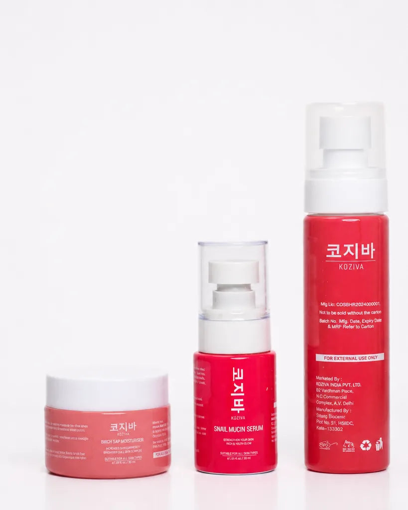 Koziva rice toner, snail mucin serum and birch sap moisturiser grouped on a white studio surface